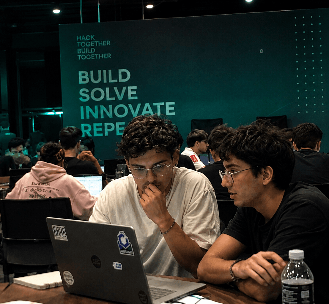 Builders collaborating at a hackathon